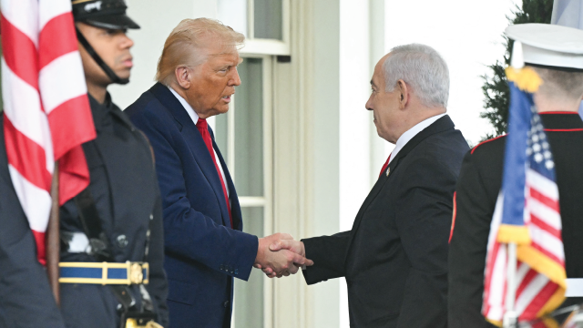 U.S. President Donald Trump shakes hands with Israeli Prime Minister Benjamin Netanyahu as he welcomes him to the White House on April 7, 2025. (Saul Loeb/AFP via Getty Images)