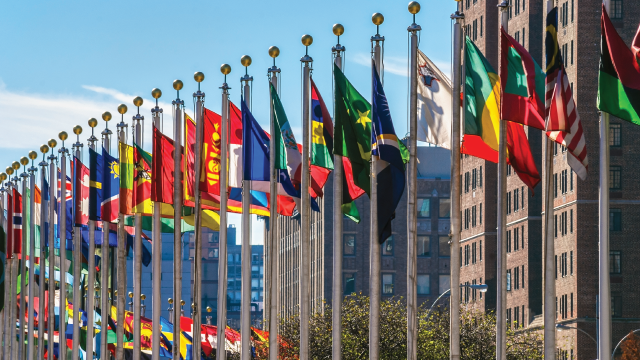 International flags outside the United Nations building in New York City. (andykazie/Getty Images)