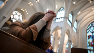 A parishioner prays during the Ash Wednesday service at the Cathedral Basilica of the Immaculate Conception in Denver on Feb. 18, 2026. (AAron Ontiveroz/The Denver Post via Getty Images)