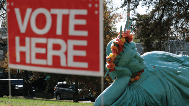 A Statue of Liberty sculpture is displayed outside a polling station in Arlington, Virginia, on Nov. 4, 2025. (Alex Wong/Getty Images)